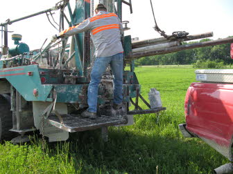 Drilling test hole.