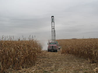 Drilling test hole.